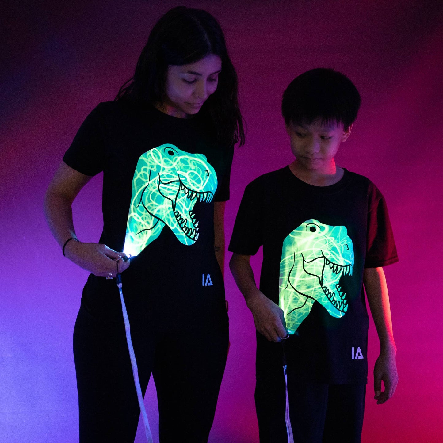 Illuminated Apparel - Interactive Glow T-Shirt - Dinosaur T-Rex: 7-8 Years Old
